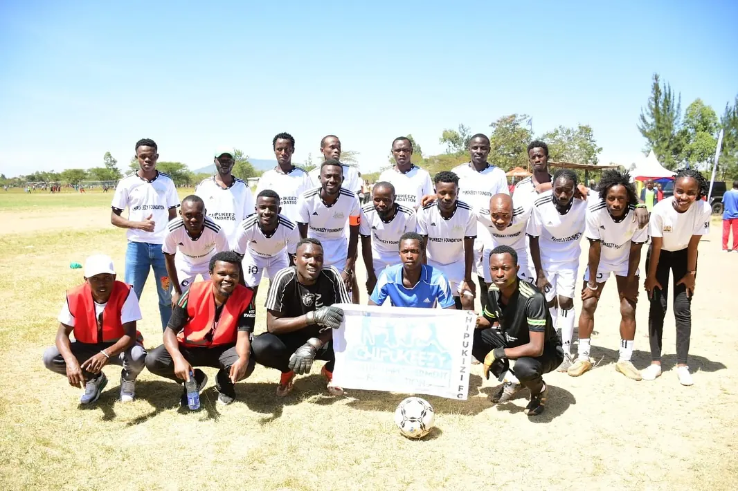 The Chipukizi FC squad lined up before kickoff.