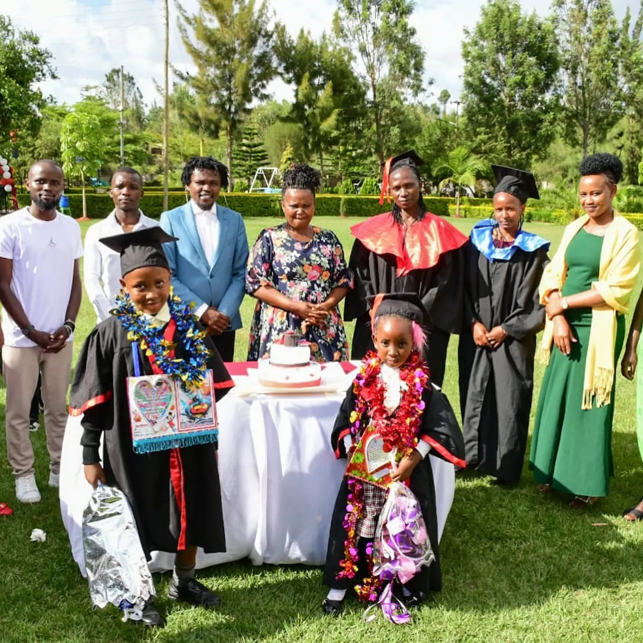 A graduate celebrating with family after the ceremony.