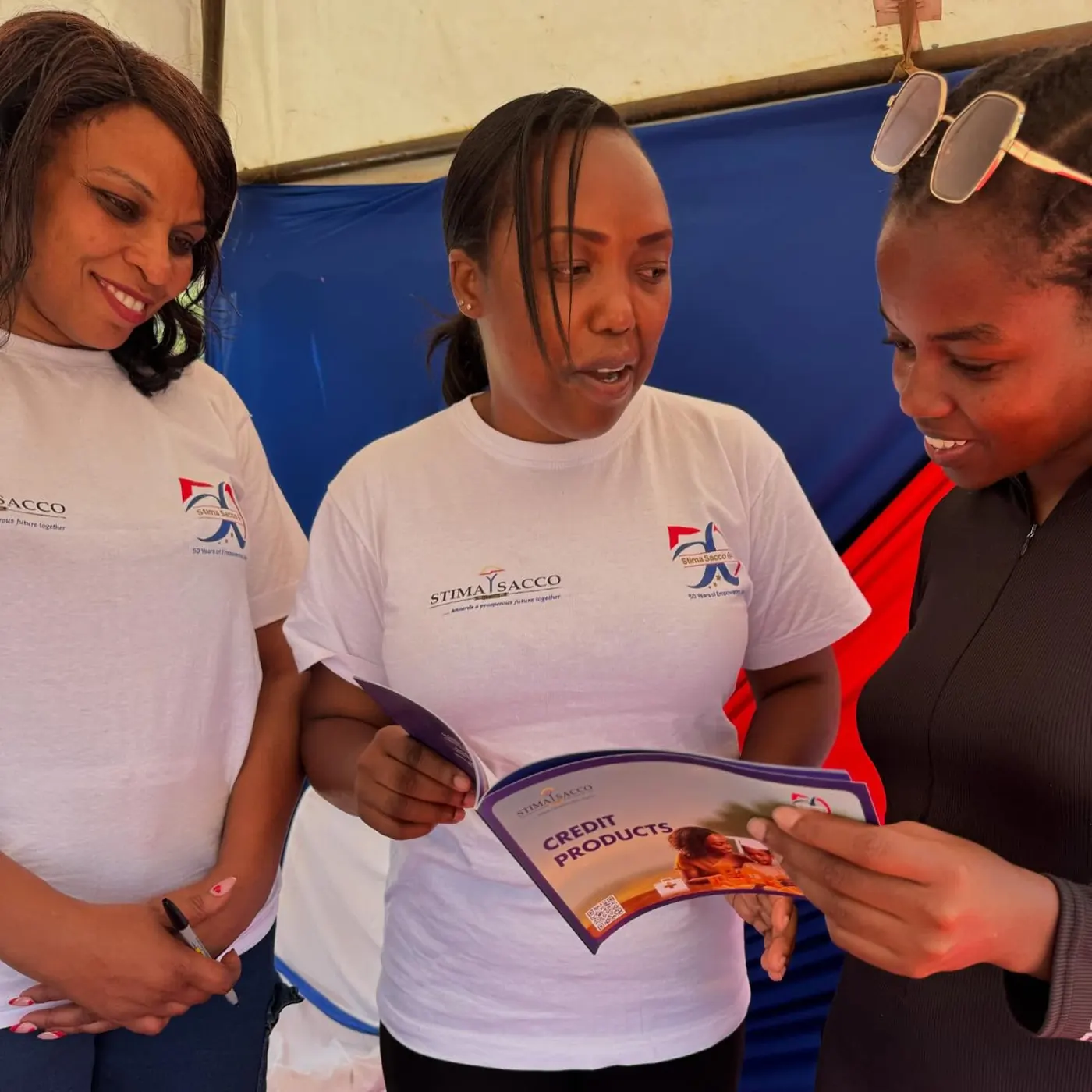 Stima Sacco running a financial literacy session for young adults.