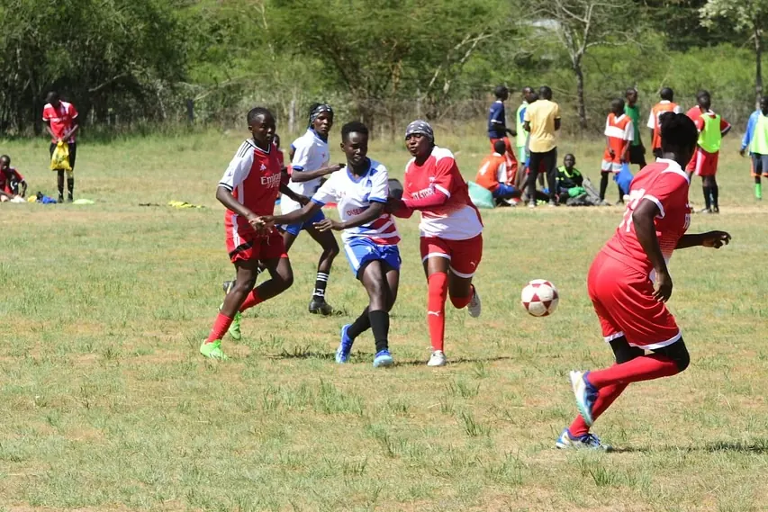 Girls' teams competing in a football match at the Tala Opens tournament