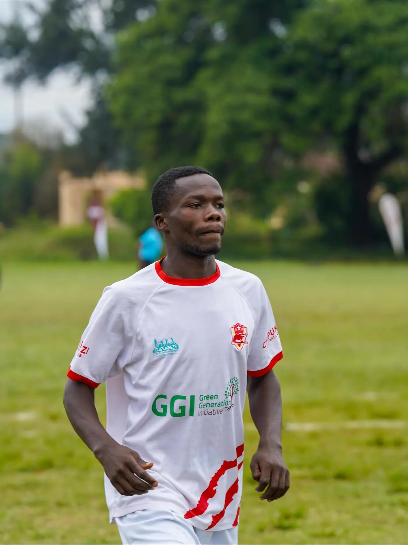 Chipukizi FC players warming up before kickoff.