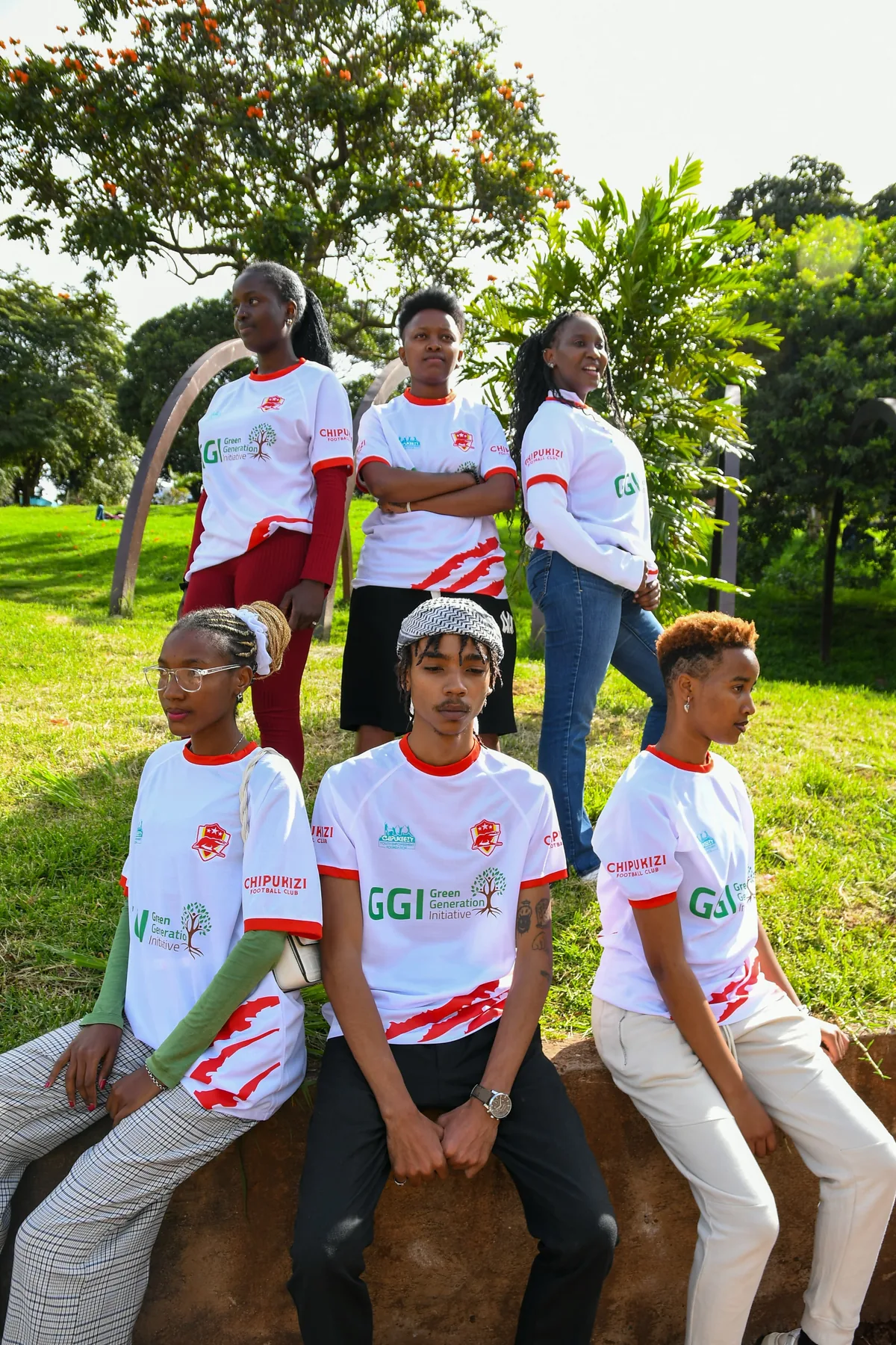 Group seated in official Chipukizi FC jerseys