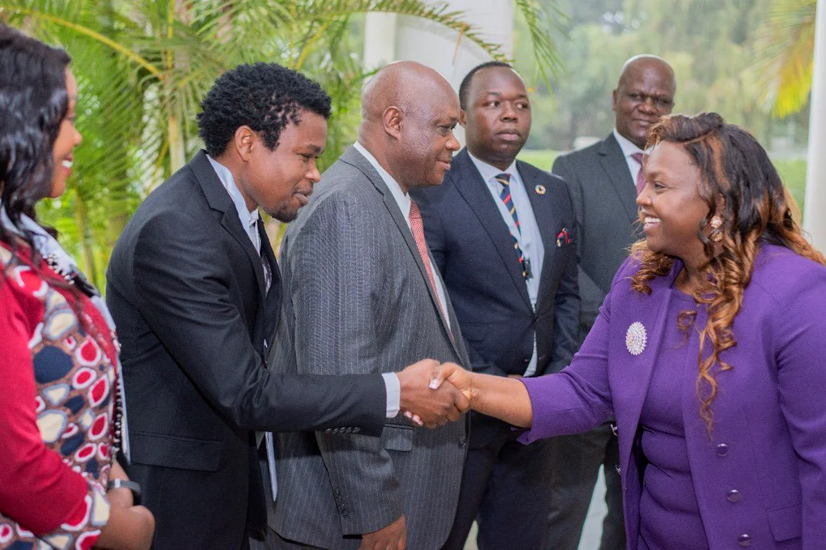 CYEF leadership greeting stakeholders during a consultative workshop
